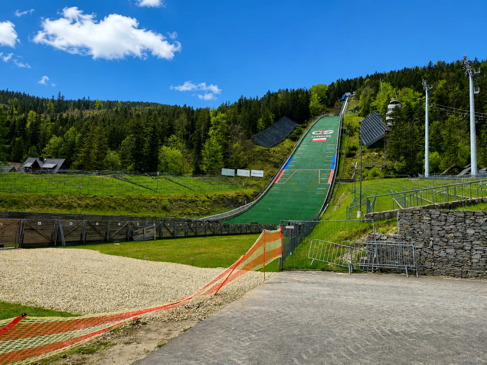 Wielka Krokiew ski jump with its green landing slope in summer