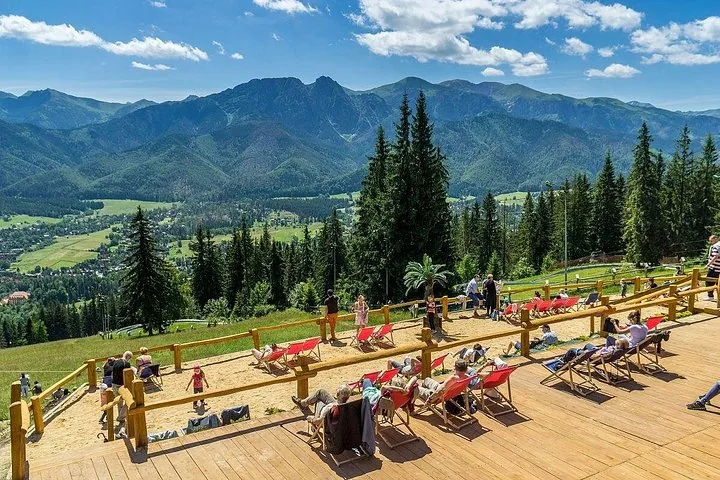 Deckchairs on a hilltop terrace above Zakopane facing the mountains